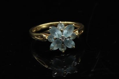 null 18k (750) yellow gold flower ring set with round and navette aquamarines and...