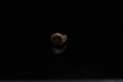 Yellow gold signet ring monogrammed in gold...