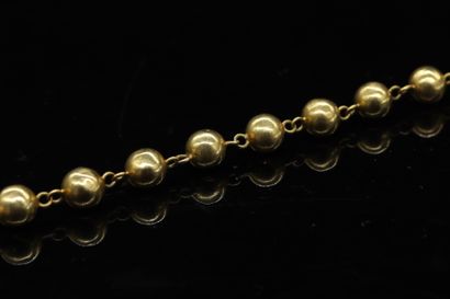Bracelet boule en or jaune 18k (750). 

Poinçon...