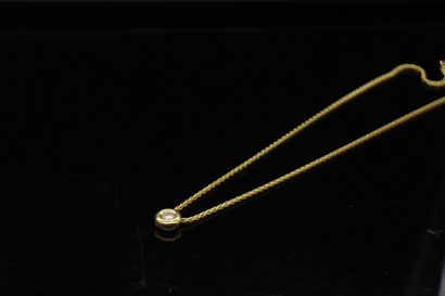 18k (750) yellow gold chain and its pendant...