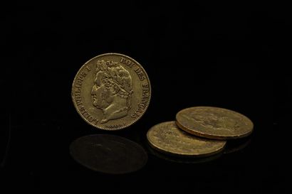 Three gold coins of 20 francs Louis-Philippe...