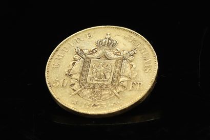 null Coin of 50 Francs in gold Napoleon III bare head (1855).

Weight : 16.07 g.