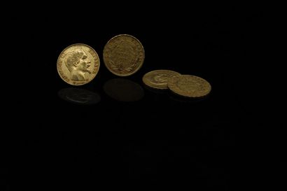 Four gold coins of 20 francs Napoleon III...