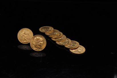 Nine gold coins of 20 francs Coq 1910.

1910...