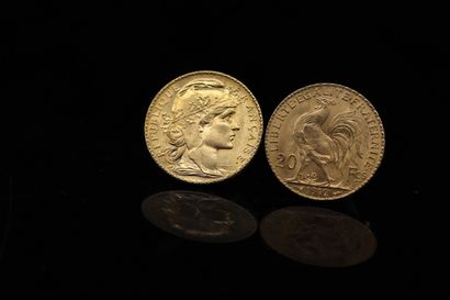 Two gold coins of 20 francs Coq 1912.

1912...