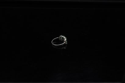 null Silver ring 950° decorated with small oval emeralds and white stones. 

Finger...