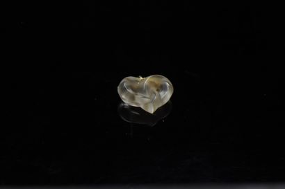 null LALIQUE

Pendant in gilded metal stylizing a heart in molded glass.

Signed...