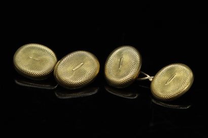 null Pair of oval and guilloche cufflinks in 18k (750) yellow gold.



Weight : 4.10...