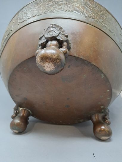 null Large bronze incense burner decorated in reserves with animals in the lower...