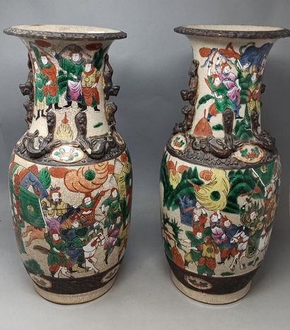 null Pair of Nanking stoneware vases with polychrome enamel decoration of battle...