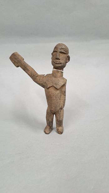 null LOBI, Côte d'Ivoire,

Statuette masculine avec bras droit levé.

H. 26 cm
