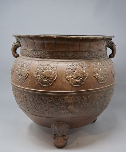 null Large bronze incense burner decorated in reserves with animals in the lower...