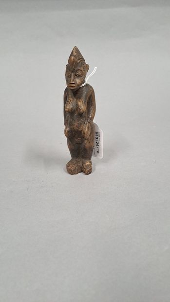 null SENOUFO, Côte d'Ivoire, 

Statuette féminine de la divination 

H. : 13.5 c...