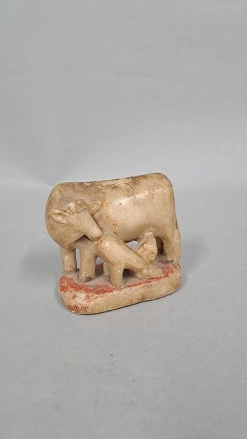 null Stone subject representing an ox formerly polychromed and gilded

H. 8 cm