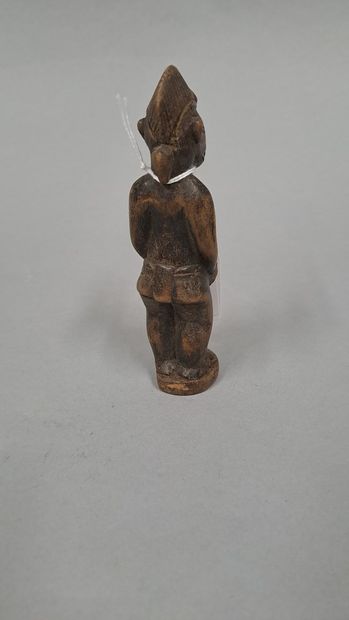 null SENOUFO, Côte d'Ivoire, 

Statuette féminine de la divination 

H. : 13.5 c...