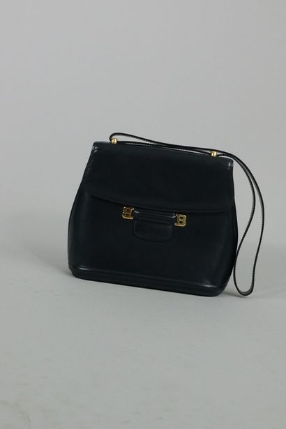 null 
BALLY

Circa 1970



Hand or shoulder bag made of black box leather and gold...