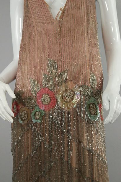 null ANONYMOUS Circa 1925



Cocktail dress in pink muslin embroidered with seed...