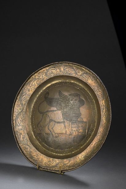 null Rare offering dish in engraved and punched brass. Curved bottom decorated with...