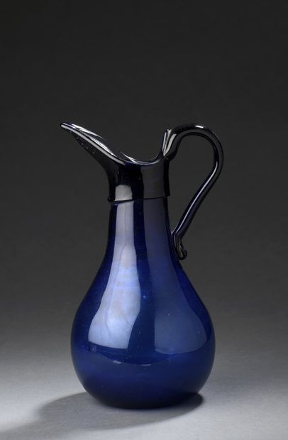 null Cider pitcher in cobalt blue glass, hollow handle. 

Normandy, 19th century...