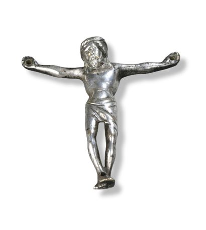 Christ en bronze argenté, fonte creuse. Tête...