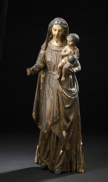 null Vierge à l'Enfant en bois sculpté, polychromé et doré, dos creusé et refermé....