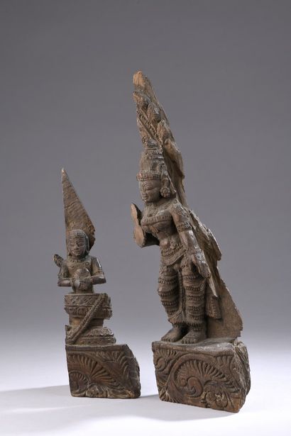 null INDIA - 19th century

Two elements of a chariot carved with Buddha seated on...