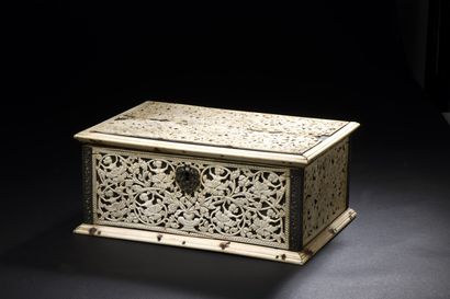 null Wooden case covered on all sides with carved and openwork ivory plates decorated...