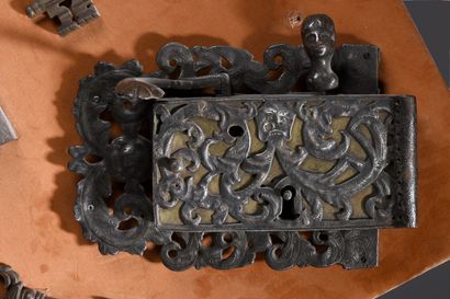 null Lot composed of five locks with scrolls and foliage decoration and eighteen...