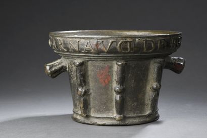 null Large bronze mortar with two fluted grips, six double baluster buttresses, inscription...