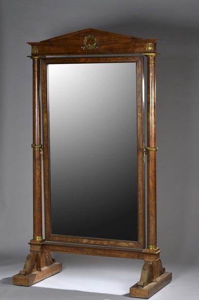 null Mahogany and mahogany veneer psyche with a mobile mirror, the columnar uprights...
