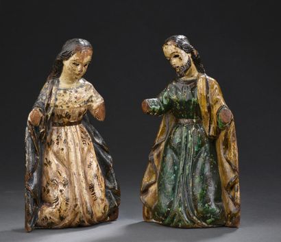 null Virgin and Saint Joseph in carved wood, polychromed and gilded. Kneeling both,...