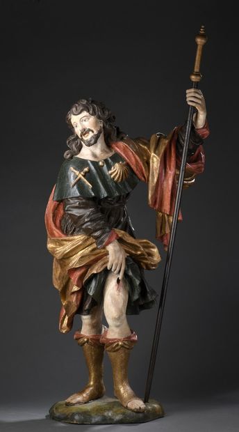null Saint Roch in wood carved in the round, polychromed and gilded. Standing, he...