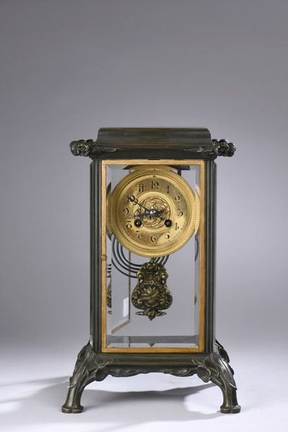 null FRENCH WORK 1910 

Gilt bronze table clock decorated with poppy buds and foliage,...