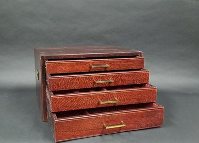 null Wooden chest tinted with silverware, gilded metal handles and grips.
20th century...