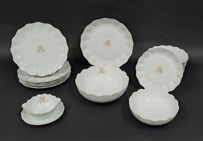 null Part of table service out of white porcelain with moved decoration, the parts...