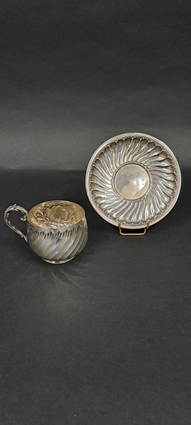 null ROUSSEL
Cup and its saucer out of silver (925) with decoration of ribs twisted...