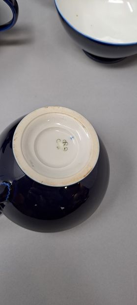 null SEVRES 
Twelve tea cups on pedestal in blue porcelain. 
Pieces said of waste,...