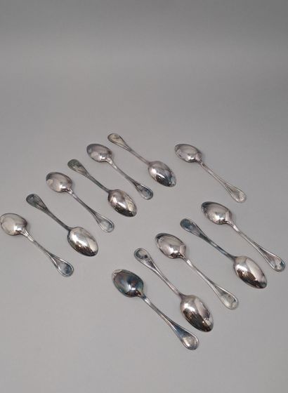 null CHRISTOFLE
Lot of twelve small spoons in silver plated metal, net model. 
Goldsmith...