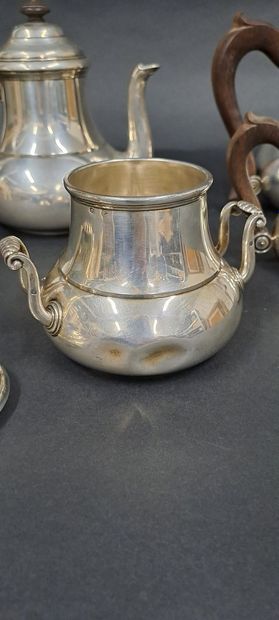 null HENIN and COMPANY
Silver (925) tea-coffee service with baluster body, spout...