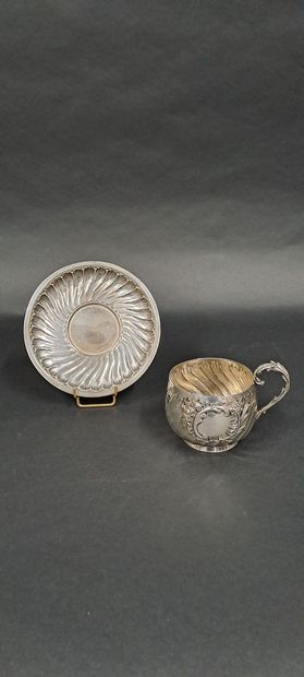 null ROUSSEL
Cup and its saucer out of silver (925) with decoration of ribs twisted...