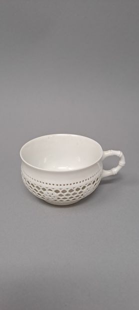 null SEVRES 
Part of coffee service in white reticulated porcelain, Chinese model,...