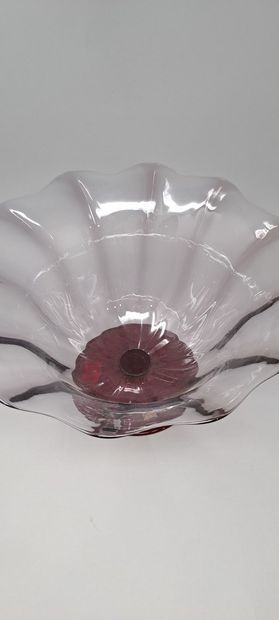 null Large poly-lobed glass bowl resting on a round base of red color, Italian work...