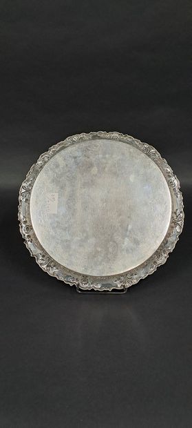 null Round dish in silver with floral decoration.
Marked: 900 - Goldsmith's mark:...