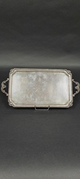 null Small rectangular silver tray, the edges with friezes of pearls sown with acanthus...