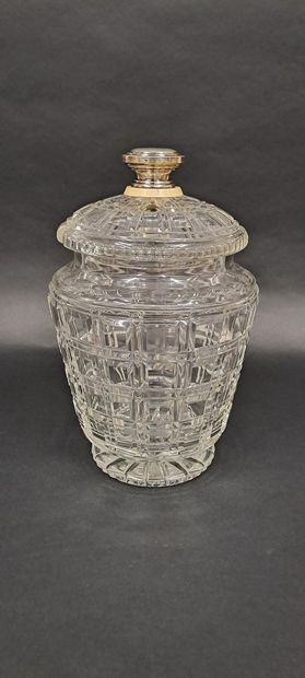 null A large cut crystal punch bowl on a pedestal, the lid flanked by a silver 800...