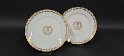 null SEVRES 
Suite of two plates with gold decoration in the center of the figure...