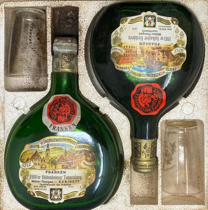 null 2 bottles of the wine cooperative of the Kitzingen region, in a box with two...