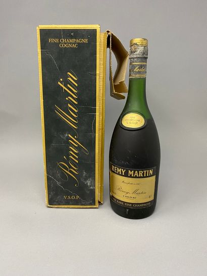 null 3 bottles of COGNAC (2 Rémy Martin, 1 of 50 cl, 1 Martell)