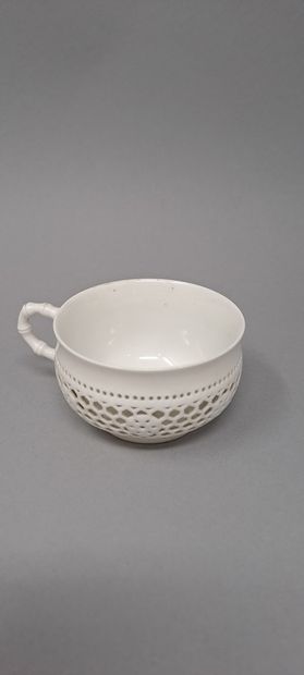 null SEVRES 
Part of coffee service in white reticulated porcelain, Chinese model,...