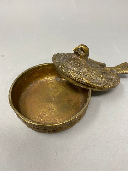 null A bombonniere in the shape of a bird in a nest 
Gilded bronze 
5 x 9.5 cm in...